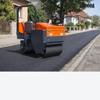 LHD-YL700Z 1ton ride on twin drum road roller compacting a new asphalt surface on a residential street