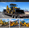 LHD-388H backhoe loader loaded for export: heavy flatbed road transport, ramp loading, frame-container sea freight lashing and handover on site