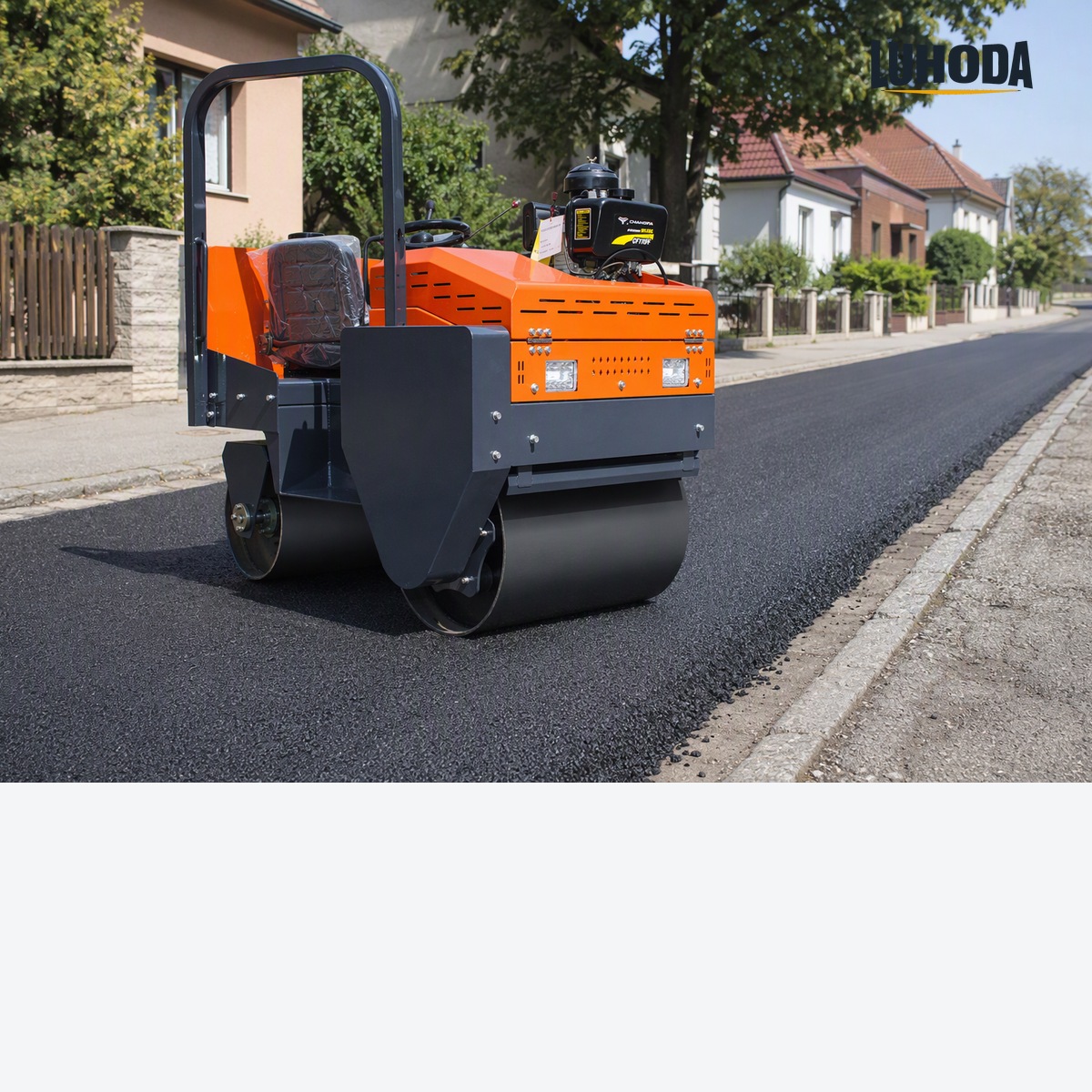 LHD-YL700Z 1ton ride on twin drum road roller compacting a new asphalt surface on a residential street