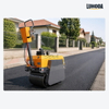 LHD-YLS600 hand pull double drum road roller compacting a new asphalt surface on a residential street