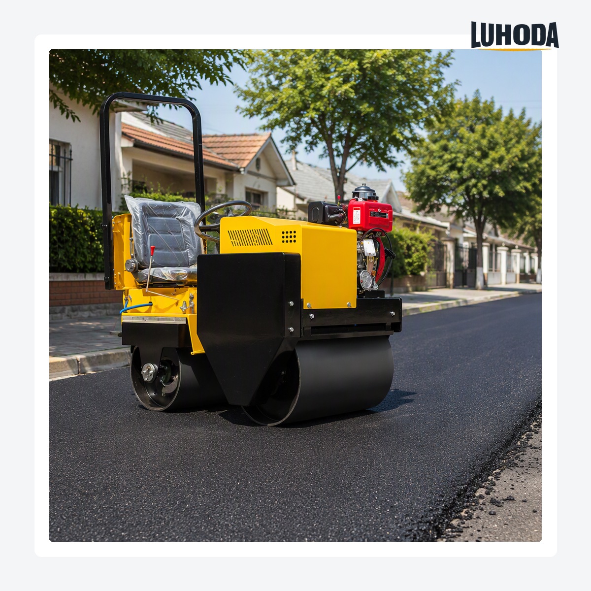 LHD-YL700Z ride on twin drum road roller compacting a new asphalt surface on a residential street
