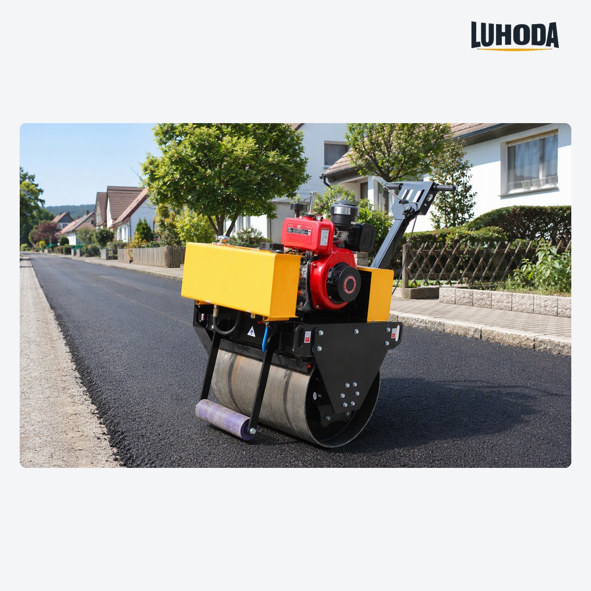 LHD-YL700 hand pull single drum road roller compacting a new asphalt surface course on a residential street